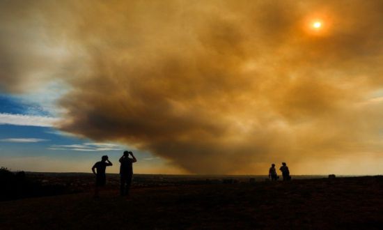 مدينة مدريد محاصرة بالدخان والرماد
